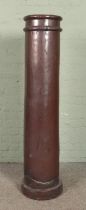 A 19th century 'Long Tom' tall standing chimney pot. Height 151.5cm. Slight crack to the rim on