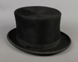 A vintage gentleman's top hat, size 7 1/8.