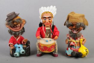 Three vintage battery operated toys to include Alps tinplate Native American drummer and two