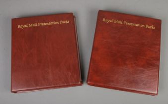 Two albums "Royal Mail Presentation Packs" with approximately 80 presentation packs.