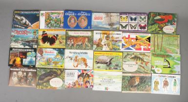 A collection of 24 complete Brooke Bond Tea picture card albums. To include Tropical Birds,