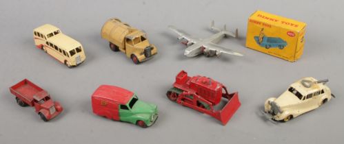 A small collection of mostly vintage Dinky Toys diecast vehicles. Includes boxed Dinky Toys B.E.V