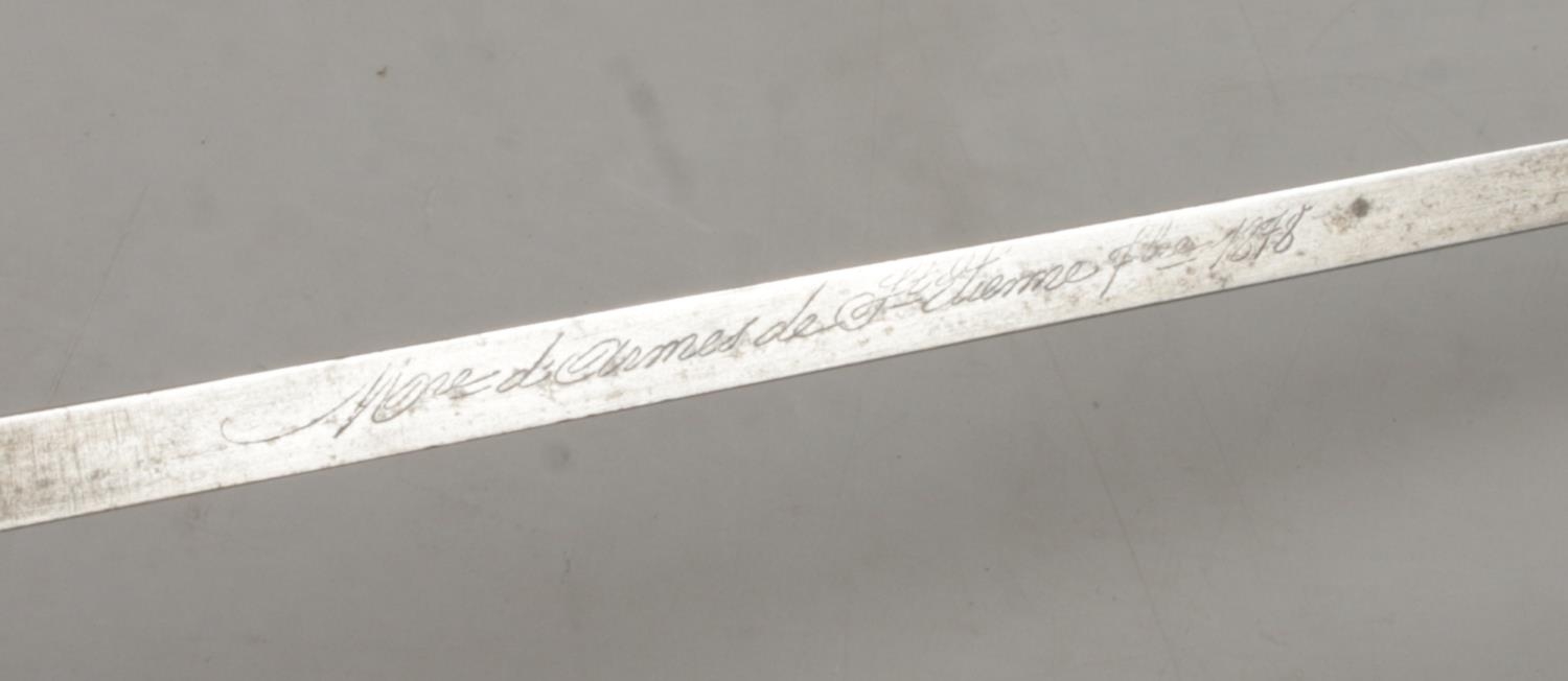 A French 1874 bayonet with scabbard. Inscribed to edge of blade and dated 1878. Blade length 52cm. - Image 4 of 4