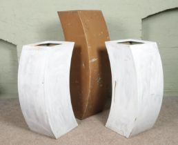 Three modernist fibre glass planters. Heights 120cm and 90cm.