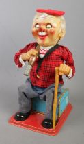 A Rosko toys battery operated tinplate McGregor.