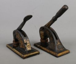 Two Victorian desk stamps/punches, one bearing label for Jordan & Sons, Chancery Lane, London.