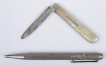 A silver blade fruit knife with mother of pearl handle along with a silver propelling pencil.