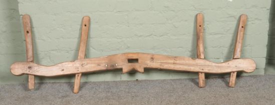 A vintage wooden yoke. Length 163cm.