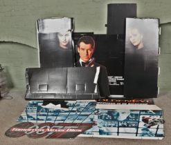 A collection of James Bond promotional film advertisement displays to include Goldeneye, Tomorrow