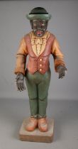 A large wooden butler figure. Hx100cm