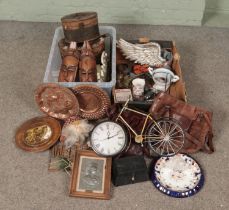 Two boxes of miscellaneous. Includes tribal masks, bicycle clock, bags, storage boxes etc.