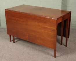 A mahogany drop leaf gateleg table featuring inlaid decoration and tapered legs. Approx.