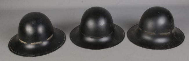 Three WWII Zuckerman Civil War defence helmets.