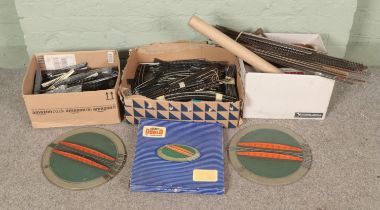 A large quantity of OO gauge and a small amount of O gauge track including three Hornby Dublo OO
