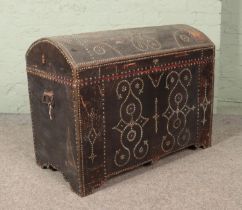 An antique Eastern style trunk with studded decoration. 70cm x 90cm x 48cm.