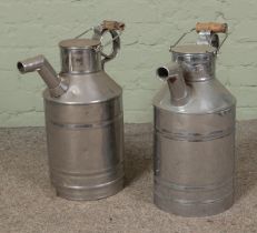 A large pair of metal water jacks/cans. Hx50cm