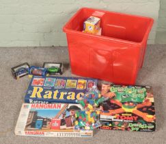 A box of vintage toys, games and collectables to include Hangman, Diecast vehicles, chess set,