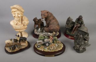 A collection of figurines including a Danbury Mint Logging at Two Acre Field, Native American