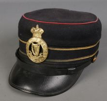 A Connaught Rangers military cap.