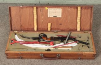 An Apollo 'Kestrel' two piece steel bow housed in vintage double sided carry case. Includes