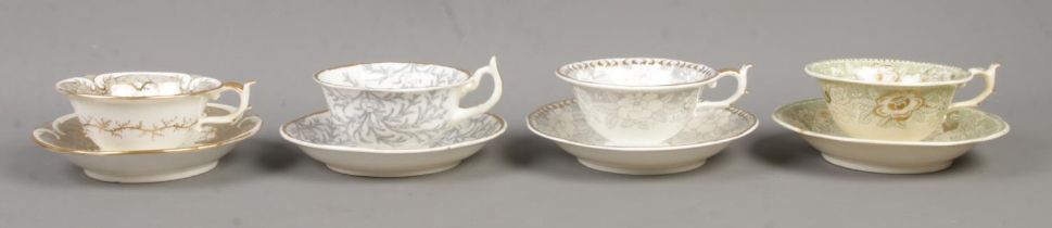 Four Rockingham cup and saucer sets, to include 1139, 1298 and seaweed patterns. All bearing puce