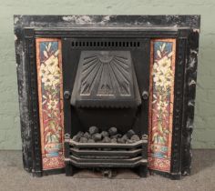 A Victorian cast iron combination tiled fireplace Hx92cm Wx98cm