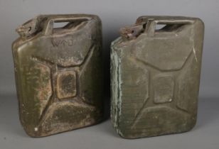 Two military jerry cans, dated 1951 and 1952. Both bearing broad arrow marks.