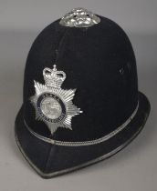 A U.K.A.E.A Constabulary police helmet.