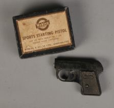A boxed Webley Sports Starting Pistol. With chequered grip. For use with .22 caliber blank