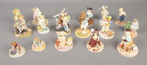 A large quantity of Coalport Treasury of Childhood figurines together with similar figurines