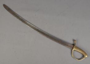 A early 20th century cavalry sword with brass handle. CANNOT POST OVERSEAS Heavily pitted.