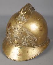 A late 19th /early 20th century French brass fireman's helmet.