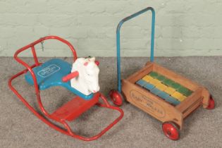 A Tri-ang rocking horse along with walker of the same brand with original blocks