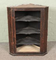 An oak corner cabinet Hx89cm missing door