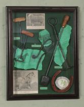 A framed display of various farming tools including Boot pulls, shepherd's crook, branding iron,