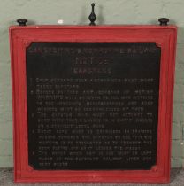 A Lancashire & Yorkshire Railway cast iron Capstans notice with painted wood surround. Sign