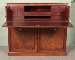 A Victorian mahogany and walnut secretaire with fitted interior. (103cm x 114cm x 55cm) Drop down