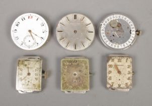 Six Longines watch faces and movements. For repair.