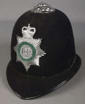 A Royal Parks Constabulary police helmet.