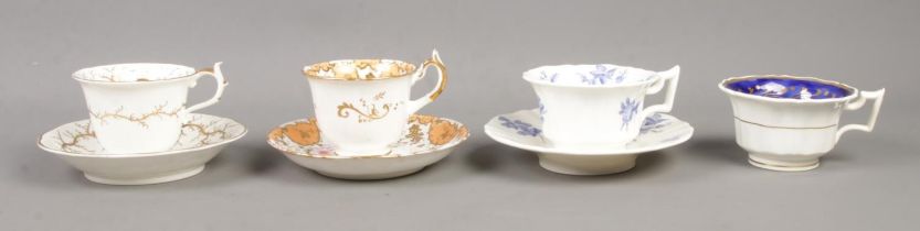 A collection of Rockingham and similar style cups and saucers, to include 1473 duo, with orange