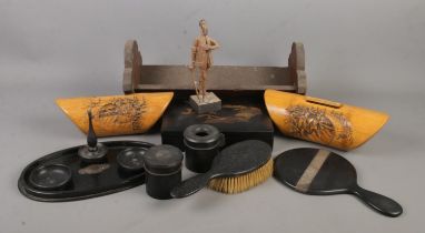 A collection of woodenwares. Includes silver mounted ebony dressing table items, Oriental