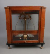 A set of Stanton Morden scientific chemical scales in glazed mahogany case Hx46cm