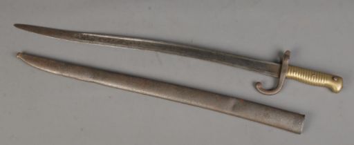 An 1866 pattern French Chassepot sword bayonet with scabbard. Length of blade (57cm) CANNOT POST
