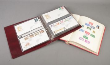 Two albums containing Royal Navy first day covers, Great Britain pre decimal and decimal stamps plus