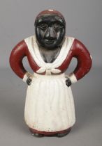 A cast iron Aunt Jemima money bank.