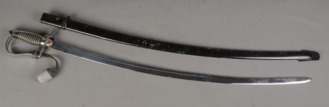 An East German Officers dress sword with scabbard. Length of blade (83cm) CANNOT POST OVERSEAS