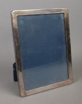 A silver mounted rectangular photo frame, assayed for Sheffield, 1991 by Carr's of Sheffield. For 7"