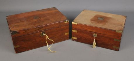 Two brass bound stationary boxes to include example set with green leather inset. Both boxes are