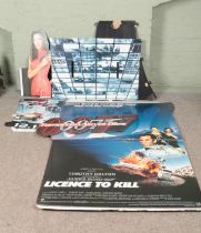 A collection of James Bond promotional film advertisement displays to include License to Kill,