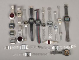 An assortment of digital wristwatches, to include several Casio and Braddon examples.